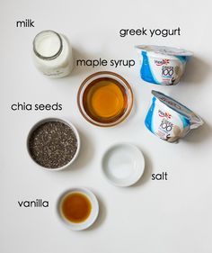 ingredients to make an oatmeal smoothie laid out on a white surface