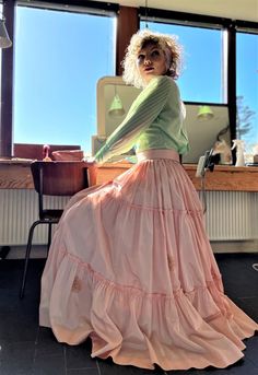 Size M The skirt is made out of used vintage taffeta silk from the 1950s. The silk has a few sign of use. Please see photo. Waist 79 cm - 31,1 inches  Length 100 cm - 39,37 inches  By request waist can be adjusted shop@bywaltz.dk Petti skin is sold separately  Follow us on Instagram @by_waltz https://www.instagram.com/by_waltz/ Spring Fitted Taffeta Skirt, Vintage Voluminous Full Skirt Petticoat, Vintage Party Petticoat With Ruffled Skirt, Pink Silk Full Skirt, Vintage Full Voluminous Petticoat, Vintage Silk Long Skirt, Vintage Ruffled Skirt For Party, Vintage Ruffled Spring Petticoat, Vintage Ruffled Petticoat For Spring