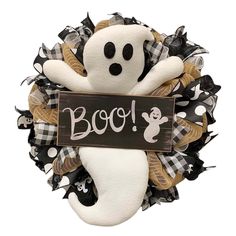 a halloween wreath with a ghost and boo on it