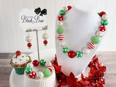 "A festive Christmas palette of red and green, along with my special Christmas sprinkles beads is the perfect thing for Christmas baking. Makes a great stocking stuffer or Christmas present. A matching necklace with a rhinestone Gingerbread Man is also available! Check my Christmas section to find that listing. Visit my Christmas section for more festive necklaces: https://www.etsy.com/shop/ChunkyStuffByLBB?section_id=16141299&ref=shopsection_leftnav_5 ✔ All necklaces come with a 2\" extende Christmas Beaded Necklaces, Festive Christmas Beads, Christmas Party Beaded Necklaces With Round Beads, Christmas Party Round Bead Necklaces, Christmas Gift Beaded Necklaces With Colorful Beads, Christmas Beaded Necklaces With Colorful Beads For Gift, Festive Christmas Beads With Round Shape, Christmas Festive Round Beads, Chunky Necklaces Statement Unique Statement Jewelry By Bling Beaded Baubles