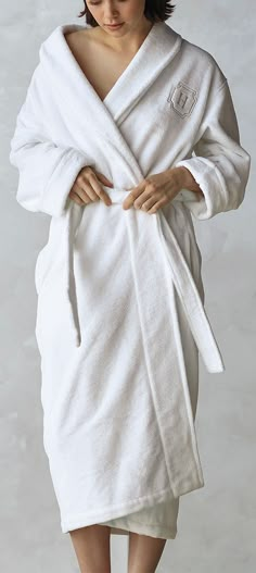 For a skin-pampering indulgence that rivals a day at the spa, wrap yourself in our ultra-soft robe. The robe features a plush 280 gsm in luxuriously absorbent Turkish cotton and an ultra poly-fleece exterior for sumptuous warmth and relaxation après shower. Woven in a soft cotton blend, our Resort Plush Slippers are a perfect match. Cotton Long Sleeve Robe For Spa, Long Sleeve Cotton Spa Robe, Long Sleeve Cotton Robe For Spa, Long Sleeve Cotton Robe For Wellness, Cozy White Robe For Relaxation, White Cozy Sleep Robe, Cozy White Sleep Robe, White Cotton Relaxed Fit Robe, White Long Sleeve Bathrobe