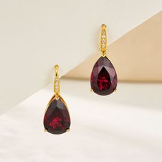 14K Solid Gold 2 Pieces 8 x 12 mm Garnet｜Red｜Pear｜Eye Clean Garnet CTW: 7.20 Diamond Grade: G Color｜VS Clarity Diamond CTW: 0.05 Detachable Cultured Baroque Pearls Approx. 12-13 mm Measurements: 1 1/4 " length｜1/2 " width Convertible Features: You can wear the natural gemstones alone or with detachable pearls for a more stunning look. Our unique design allows you to MIX and MATCH with other gemstones or pearls from our convertible collections, perfect for any occasion or style! Elegant Pear-shaped Ruby Jewelry, Formal Yellow Gold Earrings With Gemstone Accents, Formal Pear-shaped Ruby Jewelry, Elegant Ruby Earrings With 17 Jewels, Classic Pear-shaped Ruby Jewelry, Elegant Ruby Earrings In Yellow Gold, Elegant Yellow Gold Ruby Earrings, Elegant Ruby Earrings For Celebrations, Ruby Teardrop Earrings For Formal Occasions