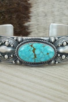 Turquoise & Sterling Silver Bracelet - Derrick Gordon – High Lonesome Trading Southwestern Style Stamped Turquoise Bracelets, Southwestern Style Turquoise Stamped Bracelets, Southwestern Stamped Turquoise Sterling Silver Bracelet, Southwestern Style Sterling Silver Turquoise Bracelet, Southwestern Turquoise Stamped Sterling Silver Bracelet, Western Silver Bracelet With Patina, Western Style Turquoise Stamped Bracelets, Turquoise Western Style Collectible Bracelets, Western Sterling Silver Concho Bracelets