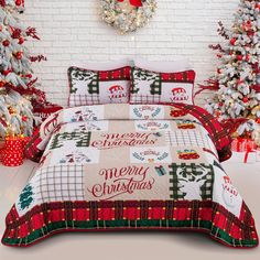 a christmas themed bed set with trees and presents on the wall in front of it