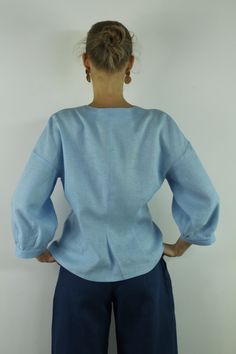 "Write the selected color in the message Handmade sky blue V neck linen blouse with front buttons and long sleeves, perfect for casual wear and suitable for any occasion in any season Details: - 100% natural linen produced in Europe ; - medium weight (180 gram per square meter); - color: sky blue, could be any from our colors catalog (color samples at the photo); Made to order, approximately a few days, If you have any questions please message me and I will be glad to answer. Size guide : Size X Light Blue Tops With Button Cuffs For Daywear, Light Blue Long Sleeve Tops For Daywear, Light Blue Summer Tops With Button Cuffs, Blue Linen V-neck Blouse, Light Wash Linen Button-up Top, Light Blue Relaxed Fit Blouse With Buttons, Light Blue Blouse With Buttons And Relaxed Fit, Linen Tops With Button Cuffs For Daywear, Light Blue Long Sleeve Tops With Button Cuffs