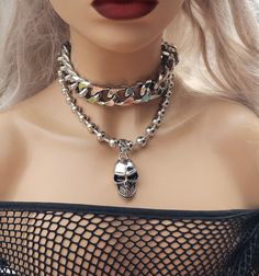 This listing is just for the handmade chunky Stainless Steel ball chain goth choker with bug skull pendant. A link to the other chain choker is below. This is a stunning piece of alternative punk fashion that will elevate any outfit with its bold and edgy look.  Oversized 10mm stainless steel ball chain & skull pendant (18")   Makes a great gift for the special woman in your life who loves to express herself through bold and unique fashion choices. DETAILS: ❤ Premium shiny polished stainless ste Emo Style Festival Jewelry With Chain, Punk Metal Choker For Alternative Fashion, Grunge Necklaces For Halloween, Emo Metal Necklace For Festivals, Punk Halloween Chain Necklaces, Alternative Metal Choker For Halloween, Punk Halloween Chain Necklace, Emo Metal Choker For Halloween, Punk Style Halloween Chain Necklace