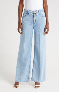 A tie at the high waist adds weekend-ready style to full-length, casual-chic wide-leg jeans made from soft, nicely draped nonstretch denim. 30 1/2" inseam; 22" leg opening; 11 1/2" front rise; 16" back rise (size 29) Tie waist Five-pocket style 60% cotton, 40% lyocell Machine wash, tumble dry Imported High Waist Jeans For Elevated Casual Occasions, High Waist Jeans For Elevated Casual Look, Versatile High Rise Wide Leg Pants For Spring, Chic Denim Wide Leg Pants For Fall, Mid-rise Jeans For Elevated Casual Spring Wear, Chic High Rise Wide Leg Pants For Fall, Spring Mid-rise Jeans For Elevated Casual Occasions, Spring Wide Leg Jeans For Workwear, Trendy High Waist Flare Jeans For Elevated Casual Occasions