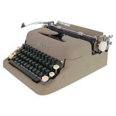 an old - fashioned typewriter is shown on a white background with clippings