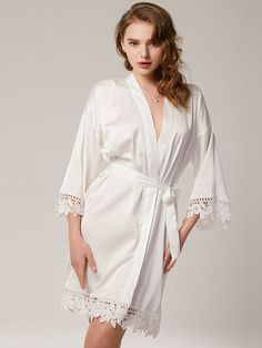 Must have bride bridesmaid robes -made of highest quality charmeuse satin, super soft, light and comfy. Different from normal satin, the buttery soft satin looks and feels like real silk. Gives you the feeling of being at an exclusive spa at home! It will feel so good against your skin. It won't get worse even after repeated washings; Self Tie closure Machine Wash Love the look of bride bridesmaid robes with lace trim? Same—we can't get enough of them! Check out these pretty bridal party robes f Satin Wedding Night Sleepwear, Elegant Solid Satin Sleepwear, Cream Satin Robe For Wedding Night, Cream Satin Sleepwear For Summer, Elegant Robe For Wedding Night, Elegant Satin Summer Robe, Elegant Summer Satin Robe, Elegant Satin Bridesmaid Robe, Summer Wedding Robe With Lace Trim