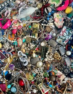 a pile of assorted jewelry sitting next to each other