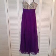 Absolutely Gorgeous Dress From Angela & Alison! Purple Flowy Chiffon With Rhinestone Gemstones. Fully Lined With Padded Breast. Strapless. Zipper Side And Wide Ruched Waist. Size Is 16. Armpit To Armpit Is 18 1/2", Waist Us 16", Armpit To Hem Is 54". Excellent Condition Other Than A Few Loose Rhinestone. Purple A-line Maxi Dress For Party, Purple Embellished Sleeveless Evening Dress, Elegant A-line Purple Maxi Dress, Purple Sleeveless Embellished Sequin Dress, Luxury Purple Floor-length Maxi Dress, Maxi Gown Dress, Chiffon Gown, Gorgeous Dresses, Chiffon