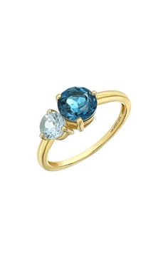 Two prong-set semiprecious stones bring vibrant sparkle to the center of this handcrafted 14-karat-gold ring and adds rich color to any stack. 1/2"W x 1/4"L setting Total stone weight: 1.43ct. 14k gold/blue topaz and peridot, blue topaz and citrine or blue topaz Imported 14k Yellow Gold Multi-stone Gemstones, Yellow Gold Topaz Rings In Fine Jewelry Style, Yellow Gold Topaz Rings Fine Jewelry, Yellow Gold Blue Topaz Rings With Brilliant Cut, Yellow Gold Topaz Ring With Round Cut Gemstone, Yellow Gold Rings With Brilliant Cut Blue Topaz, Yellow Gold Round Cut Topaz Ring With Gemstone, 14k Gold Round Gemstones For Fine Jewelry, Multi-stone Yellow Gold Birthstone Ring In 14k