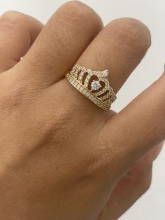 -100% 14k gold  -24/7/365 wearable  -size 7  -sizing upon request  -will not tarnish, nor change color  -let us know any questions  -item sold buy piece. Weight is undetermined Gold Cubic Zirconia Crown Ring, 14k Gold Crown Design Diamond Ring, Gold Crown Design Diamond Ring In 14k Gold, Gold Diamond Ring With Crown Design In 14k, Gold Crown Shaped Diamond Ring, 14k Gold Crown Design Fine Jewelry, Luxury Gold Rings With Crown Design, Yellow Gold Diamond Ring With Crown Design, Open Ring With Crown Design For Promise