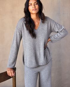 Sweater sets are having a moment, and we're here for it. Wear this super soft v-neck on its own or pair it our matching Stowaway Pant for an easy throw-on-and-go fall fit. Stay warm while looking effortlessly pulled together in this luxurious blend of superfine wool and recycled cashmere. Relaxed v-neck sweater with drop shoulders, side slits and high-low hem. Made with a fine 12-gauge Italian yarn with roll edge neckline and hem. Sweater Sets, Summer Layers, Henley Sweater, Fall Fit, Polo Sweater, Women's Sweaters, Sweater Set, Grey Women, Denim Pant