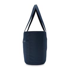 an image of a large blue bag on a white background with clippings to the side