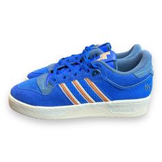 Step Up Your Sneaker Game With These Adidas Rivalry 86 Shoes In A Stylish Blue Colorway. The Low Top Design And Standard Shoe Width Make These Sneakers Perfect For Any Athletic Activity, Including Skateboarding. With Rubber Upper And Insole Material, You Can Be Sure Of The Durability And Comfort Of These Shoes. The Adidas 86 Product Line Is Known For Its Colorful And Trendy Designs, And These Shoes Are No Exception. Featuring A Unique Style Code Id4755 And Character Details In Blue, These Shoes Adidas Rivalry, Character Details, Conscious Man, Sneaker Games, Adidas Blue, Shoes Adidas, Blue Adidas, Trendy Designs, Top Design