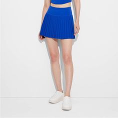 Women's Game Day Pleated Skort - Joylab Blue Small Nwt Athleisure Tennis Skirt Mid-Rise Pleated Skort Built-In Shorts Stretchy Fabric With Lining Athletic Fit Pull-On Style Recycled Polyester Product Details This Pleated Skort From Joylab In An Athletic Fit Is Designed With Built-In Fitted Shorts To Offer Additional Coverage. The Midweight Flexible Fabric With Soft Lining Lends Comfort And Freedom Of Movement Through Any Activity, While The Pull-On Style Allows For Easy Wear. Pair With A Range O Blue High-waisted Stretch Tennis Skirt, Blue Athleisure Tennis Skirt For Spring, Casual Pleated Skirt For Sports In Summer, Casual Summer Pleated Skirt For Sports, Casual Mini Skirt For Spring Workout, Sporty Short Blue Tennis Skirt, Blue Tennis Skirt For Summer Sports, Blue Athleisure Tennis Skirt, Casual Blue Tennis Skirt For Sports