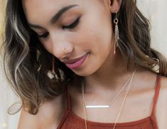 Embrace the subtle charm of our meticulously handcrafted Layered Mini Bar Necklace—an embodiment of understated elegance and timeless sophistication. Crafted with care by our skilled artisans, this empowering piece of jewelry is designed with a touch of magic, capturing attention with just the right amount of allure. Crafted from fine metal, this necklace features a slender width of 1/8", providing a barely-there feel against your skin. The delicate hand-hammered texture adds a unique charm, enh Hammered Necklace, Necklace Layering, Metal Necklace, Medallion Necklace, Necklace Minimalist, Wide Band Rings, Layered Jewelry, Layering Necklace, Mini Bar