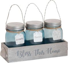 three mason jars with tags on them are sitting in a wooden holder that says,'bliss this home '