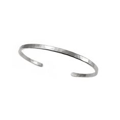 This classic, shimmery hand hammered cuff will become a permanent fixture on your wrist. It goes with everything and adds just the right delicate shine to any outfit. The cuffs are sold separately, but they look and sound amazing stacked! Available in brass, sterling silver or 14K gold fill. - Cuffs measure ~1/8" wide and 6.5" around, can be slightly adjusted Tiled Quilt, Nature Inspired Jewelry, Wide Cuff, Wooden Bowls, Nature Bracelets, Ceramic Bowls, Ring Bracelet, Ring Necklace, Gold Filled