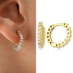 Introducing the 14k Gold Surface Prong Setting Hoop Earrings, the ultimate accessory for any fashion-savvy woman. These stunning earrings are crafted from high-quality 14k gold and feature a beautiful full eternity of sparkling CZ gemstones, making them the perfect addition to any outfit. Whether you're dressing up for a special occasion or simply looking to add a touch of elegance to your everyday wardrobe, these earrings are sure to make you feel confident and stylish. The huggie design of these earrings makes them easy to wear and perfect for everyday wear, while the prong setting ensures that the gemstones are securely in place. These earrings are also a great gift for any woman in your life, whether it's for a birthday, anniversary, or simply as a special surprise. Treat yourself or s Dazzling Yellow Gold Hoop Earrings With Prong Setting, Anniversary Huggie Earrings With Sparkling Stones, Classic Yellow Gold Hoop Earrings With Sparkling Stones, Small Hoop Huggie Earrings With Sparkling Stones For Gift, Dazzling Huggie Hoop Earrings As Gift, Hoop Diamond Earrings With Halo Design For Gifts, White Gold Hoop Earrings With Sparkling Stones For Gift, Yellow Gold Hoop Earrings With Prong Set Cubic Zirconia, Yellow Gold Hoop Earrings With Cubic Zirconia