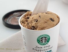 a starbucks coffee cup with chocolate chip ice cream