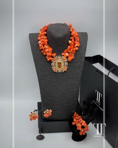 Description Our stunning Coral Bead Necklace and African pendant set are a perfect choice for anyone searching for a unique and eye-catching piece of jewellery. This ethnic necklace is ideal for fashion-forward individuals, who want to add a touch of elegance to their ensemble. Crafted from high-quality coral beads, this African beaded necklace features an intricate design that is a perfect reflection of the rich African cultures and traditions. With this fabulous necklace, you're sure to stand How To Make African Jewelry, Chip Bead Jewelry, African Wedding Jewelry, African Beaded Necklace, Nigerian Beads, Handcrafted Beaded Jewelry, Hand Beaded Bag, Beautiful Beaded Jewelry, Coral Beads Necklace