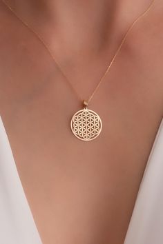 "* Gold KT: 14K Solid Gold * Chain Lengths: Adjustable, 16'' 18\", 20\", 22\", 24\" * The length of the chain in the photo is 18 inches. * Pendant length: 2.30 cm * Pendant width: 1.70 cm The Flower of Life is one of the basic sacred geometry shapes. The Flower of Life starts with the Seed of Life shape: 7 overlapping circles that build outward, forming a flower-like pattern that has been used since ancient times in many cultures around the world. Said to be the basic template for everything in The Seed Of Life, Overlapping Circles, Life Ring, The Flower Of Life, Cultures Around The World, Seed Of Life, Gold Armband, Handmade Jewelry Necklace, Solid Gold Chains