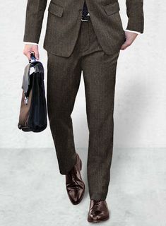 Do you want to elevate the way you look and create outfits that fit perfectly, then opt for our Haberdasher Brown Tweed Pants. Crafted from pure wool, the pants feature classic herringbone weave whereas the tweed-inspired fabric combines with contemporary tailoring that is ideal for when you want to look that bit special. 
 
 Look Includes  Haberdasher Brown Tweed Fabric  Cross Pocket  Flat Front  Two Welted Back Pockets on Trousers   You can change the look by changing the options listed. 
 
Li Tweed Pants With Pockets For Fall, Fall Tweed Bottoms With Pockets, Formal Tweed Pants With Herringbone Pattern, Formal Tweed Bottoms With Herringbone Pattern, Tweed Bottoms With Pockets For Work, Elegant Fitted Tweed Bottoms, Formal Wool Pants With Herringbone Pattern, Formal Tailored Tweed Bottoms, Tailored Tweed Pants For Fall