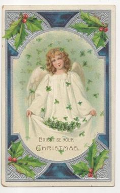 a christmas card with an angel in the middle and holly garlands around its neck