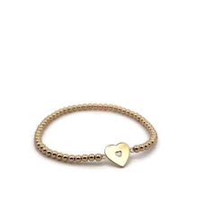 Discover elegance and charm with our LOVE HEART Gold Filled Beads Bracelet, a delightful addition to any jewelry collection. This stunning piece combines the timeless appeal of gold filled beads with a heart-shaped pendant crafted from gold plated sterling silver. Designed to be adjustable, it offers both style and comfort, making it perfect for everyday wear or special occasions. Handcrafted in our Miami workshop, each bracelet is made to order with meticulous attention to detail. We prioritize Delicate Gold Bracelets For Valentine's Day, Delicate Gold Bracelet For Valentine's Day, Heart-shaped Everyday Beaded Jewelry, Elegant Heart-shaped Jewelry With Gold Beads, Gold Beaded Heart-shaped Bracelets, Heart Shaped Beaded Gold Bracelets, Gold Beaded Heart Shaped Bracelets, Gold Heart-shaped Beaded Bracelets, Heart-shaped Gold Beaded Bracelets