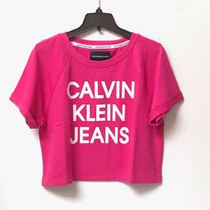 Brand New, Never Worn With Original Tag! Color: 8ee Beetroot Fitted Short Sleeve Calvin Klein T-shirt, Sporty Logo Print Cropped T-shirt For Spring, Spring Athleisure Top With Letter Print, Fitted Calvin Klein Athleisure Tops, Casual Pink Cropped T-shirt With Text Print, Spring Stretch Tops With Logo Print, Trendy Calvin Klein Top With Graphic Print, Calvin Klein Stretch Cotton Tops, Stretch Cotton Calvin Klein Tops