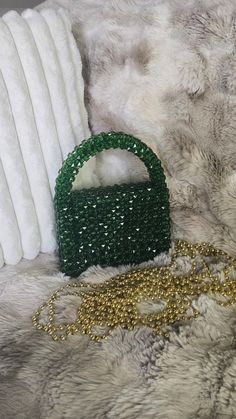 100% Handmade beaded bag for special occasion  Luxury shiny beads Exclusive design The purse is handmade with care and attention to detail, ensuring that each one is unique. Size: 7.5in*9in*3in. Color is dark green You can carry all necessary essentials and look very elegant. There is magnetic snap closure for easy access You will receive a dust bag and stylish gift box.  I believe you will collect the gorgeous memories with this luxury bag. Feel free to contact me for any question or special cu Beaded Clutch Shoulder Bag As Gift, Beaded Clutch Shoulder Bag For Gifts, Glamorous Beaded Bags As Gifts, Trendy Handheld Beaded Evening Bag, Beaded Crossbody Evening Bag For Party, Glamorous Beaded Clutch As Gift, Handheld Shoulder Bag With Rhinestones As Gift, Handheld Beaded Clutch, Green Crossbody Evening Bag For Party