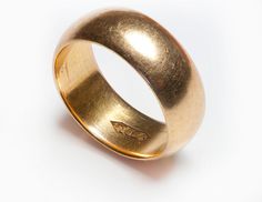 an image of a gold ring on a white background