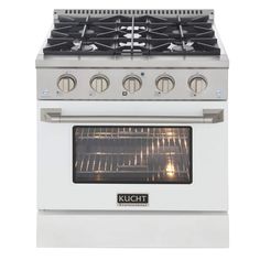 a white stove top oven sitting on top of a metal burner with the door open