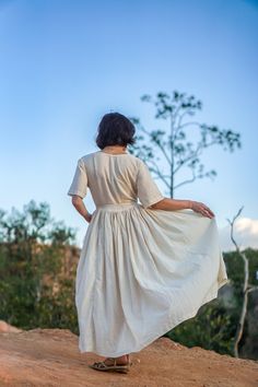 "Summer Dress, Flare Dress, Natural Bohemian Dress Gorgeous 100% soft cotton in natural color (unbleached, undyed) Sizing: Made one size to fit S to L / US: 6/8/10/12 Measurement; Chest up to 38\" Pit to pit across 19.5\" Hip free Armhole 18\" around Shoulder 16.5\" across Sleeve 10\" Sleeve hem 16\" around Length 51\" **Model is a size US 6, 33\" bust, 35\" hip, 165 cm Tall** Description: Simple empire waist maxi dress with lots of flowy fabric (5 meters) It drapes beautifully and hugs your bod Classic Beige Dresses With Pleated Waist, Classic Beige Dress With Pleated Waist, Empire Waist Maxi Dress With Fitted Bodice For Daywear, Elegant Dresses With Natural Waistline For Daytime, Elegant Dresses For Daywear, Fitted Maxi Dress With Pleated Waist, Fitted Bodice Maxi Dress With Pleated Waist, Maxi Dress With Pleated Waist And Fitted Bodice, Cream Flowy Empire Waist Dress