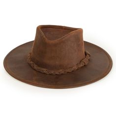 This versatile wide brimmed hat is our best-seller. Handmade from the highest-quality ruff distressed leather, this durable hat is designed to last. Create your own personalized style thanks to the steel wire that’s hidden inside the brim. The subtle leather-braided accent gives this hat a simple touch of style. Not only does it look great, it protects you from the sun and other elements. This leather hat is a distinctive style to wear fishing, camping, hunting or on any outdoor adventure. Small Western Wedding Attire, Mens Western Vest, Western Wedding Bands, Mens Western Boots, Native American Shirts, Mens Western Wear, Leather Cowboy Hats, Cowboy Outfit, Popular Hats