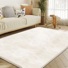 PRICES MAY VARY. 【Ultra Soft & Comfy】Fluffy area rugs meticulously crafted from ultrasoft faux rabbit fur, this rug offers an unparalleled level of comfort and an exquisite softness that simply envelops you. Tejoe Area Rugs creates a haven of sumptuous coziness.Size approx 96 x 120 inchs ( 8 x 10 ft ). 【Premium Material & Durable】 Premium & durable plush carpet is made of 650gsm high quality faux rabbit fur fabric, providing super soft touch and unparalleled comfort. The bottom of the carpet is made from a non-woven fabric and point-plastic anti-slip base so that you can use the large rug more safely. 【Elegant & Multi-Purpse Usage】The elegant rug can be seamlessly integrated into various decorating styles. It can enhance the beauty of living rooms with ease, bring elegance to sofas, gracef Rug With Ivory Couch, Faux Fur Area Rug, Fluffy Carpet, Elegant Rug, Carpets For Kids, Fur Carpet, Shaggy Rugs, Faux Fur Rug, 4x6 Area Rugs