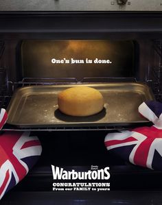 there is a bun in the oven with british flags on it