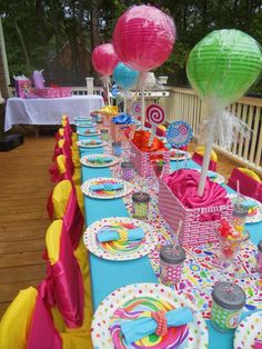 a table set up for a birthday party