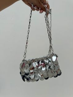 DETAILS:Stand out and shine with our silver sequin bag! Carefully crafted with a chain strap, this bag is perfect for adding a touch of glamour to any outfit. This bag is sure to make a statement and turn heads wherever you go! Silver Chain Bag For Event, Silver Chain Bag For Night Out, Glamorous Sequined Shoulder Bag For Night Out, Metallic Chain Bag For Party, Trendy Silver Evening Bag With Chain Strap, Silver Sequined Evening Bag For Party, Silver Sequin Party Evening Bag, Trendy Silver Party Bags, Silver Sequin Party Bags