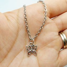 Butterfly 🦋 charm on 18 inch stainless steel chain. Trendy Silver Butterfly Necklace With Adjustable Chain, Stainless Steel Butterfly Necklace Gift, Trendy Butterfly Jewelry For Gift, Trendy Silver Necklace With Butterfly Charm, Trendy Silver Charm Necklaces For Gifts, Trendy Adjustable Silver Butterfly Necklace, Butterfly Charm Pendant Necklace As Gift, Trendy Nickel-free Charm Bracelet Gift, Butterfly Charm Pendant Necklace For Gift