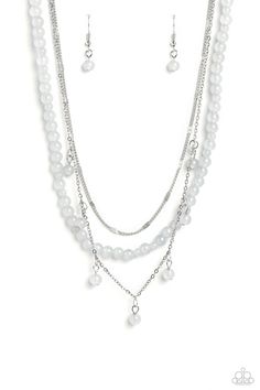 A strand of gray stone beads is paired with two strands of classic silver chain, creating effortless layers along the neckline. One of the silver chains is dotted with sections of flattened silver bars, while the other is adorned with a sampling of gray stone beading that infuses the design with playful movement. Features an adjustable clasp closure.   Sold as one individual necklace. Includes one pair of matching earrings. Happy Jewelry, Latest Jewellery Trends, Red Necklace, Silver Chains, Paparazzi Accessories, Latest Jewellery, Silver Bars, Paparazzi Jewelry, Stunning Necklace