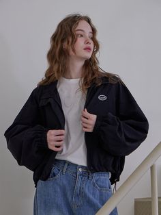 This is a modern and casual windbreaker jumper by HAINT that is made out of high quality and sturdy fabric. With refined design detail and trendy mood, you can style it for your clean and minimal daily outfit.- Sturdy nylon 100% fabric- Cropped silhouette- Chest logo embroidery detail- Adjustable string on the hem- Mesh lining with high air permeability Crop Windbreaker Outfit, Black Functional Cotton Track Jacket, Modern Black Long-sleeved Windbreaker, Modern Black Long Sleeve Windbreaker, Techwear Windbreaker With Ribbed Cuffs, Techwear Nylon Windbreaker With Ribbed Cuffs, Nylon Techwear Windbreaker For Work, Techwear Nylon Windbreaker For Work, Trendy Black Nylon Windbreaker