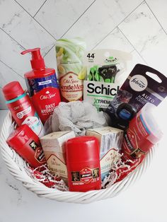 a white basket filled with lots of different types of skin care products and personal care items