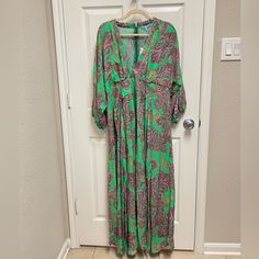 New. Size L. Green Maxi Dress. Vneck With Drape Waist Tie. Billowy Sleeves. Paisley Design Throughout. Zips In Back. Unlined. No Trades. B1-54 Green Paisley Print Maxi Dress For Vacation, Spring Green Paisley Print Midi Dress, Spring Green Paisley Midi Dress, Green Paisley Print Maxi Dress For Beach, Green Paisley Print Long Sleeve Dresses, Green Long Sleeve Dress With Paisley Print, Green Long Sleeve Paisley Print Dresses, Green V-neck Paisley Print Dress, Green V-neck Dress With Paisley Print