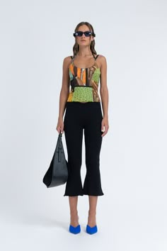 Flared Capri Pant in Black – Arthur Apparel Capri Outfits Women Summer, Summer High-waisted Parachute Pants With Side Pockets, Black Capri Pants Outfit, Chic Wide-leg Capris With Pockets, Capri Pants 2024, Relaxed Fit Wide-leg Summer Capris, 60s Capri Pants, Capris With Pockets, Cropped Leg