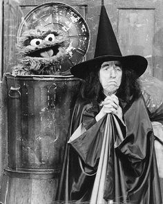 an old black and white photo of a wizard