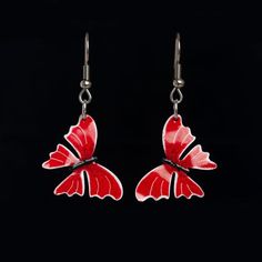 Butterfly earrings with red wings. The perfect statement earrings, these enameled  blue butterflies were created with an eclectic artisan design and hand painted with attention to detail on a pristine stainless steel base. Length: 25 mm ( 0.27" )Length with the closing: 45 mm ( 1.8" )_______________________________________________Visit my shop to enjoy more unique jewelry hand painted just for you:www.etsy.com/shop/CinkyLinky _______________________________________________ Red Hand Painted Earrings For Gift, Red Pierced Enamel Earrings, Red Hand Painted Drop Earrings, Red Enamel Pierced Earrings, Red Butterfly-shaped Jewelry Gift, Red Butterfly Jewelry For Gift, Red Butterfly Earrings For Gift, Red Enamel Earrings, Artistic Red Enamel Jewelry