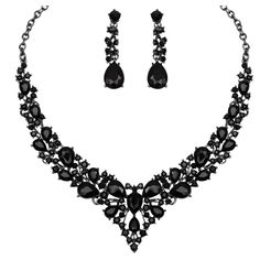 a necklace and earring set with black stones